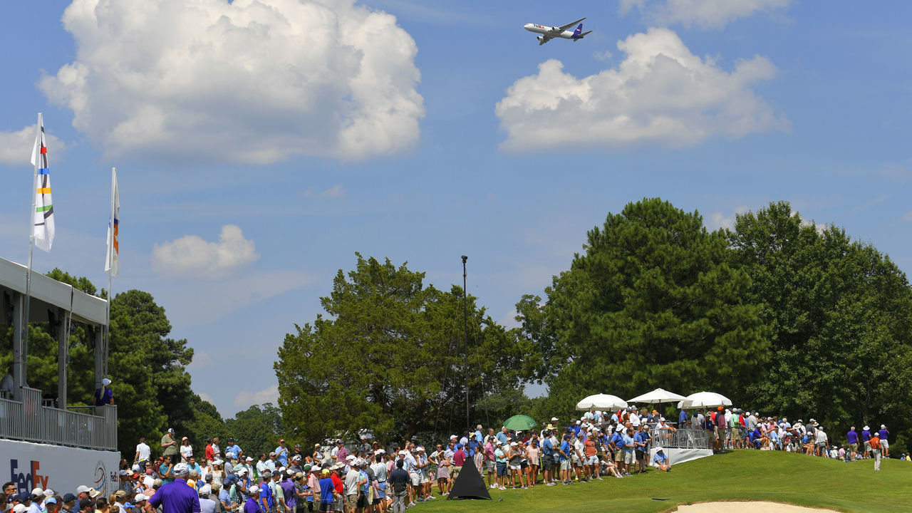 MEMPHIS, TN - JULY 27: A FedEx airplane flys over the course during the third round of the World Golf Championships-FedEx St. Jude Invitational at TPC Southwind on July 27, 2019 in Memphis, Tennessee.