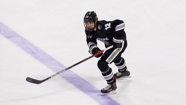 BOSTON, MA - NOVEMBER 8: Jack Dugan #12 of the Providence College Friars skates against the Boston University Terriers during NCAA men's hockey at the Agganis Arena on November 8, 2019 in Boston, Massachusetts. The game ended in a 3-3 tie.