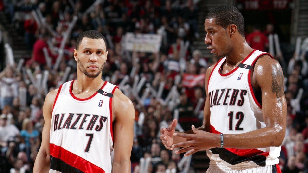PORTLAND, OR - MARCH 26: Brandon Roy #7 and LaMarcus Aldridge #12 of the Portland Trail Blazers talk on the court during the game against the Phoenix Suns at The Rose Garden on March 26, 2009 in Portland, Oregon. The Blazers won 129-109. NOTE TO USER: User expressly acknowledges and agrees that, by downloading and/or using this Photograph, user is consenting to the terms and conditions of the Getty Images License Agreement. Mandatory Copyright Notice: Copyright 2009 NBAE