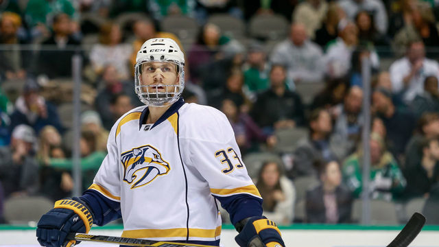 DALLAS, TX - DECEMBER 08: Nashville Predators Left Wing Colin Wilson (33) wears a face shield during the NHL game between the Nashville Predators and Dallas Stars on December 08, 2016, at American Airlines Center in Dallas TX. Dallas defeats Nashville 5-2.