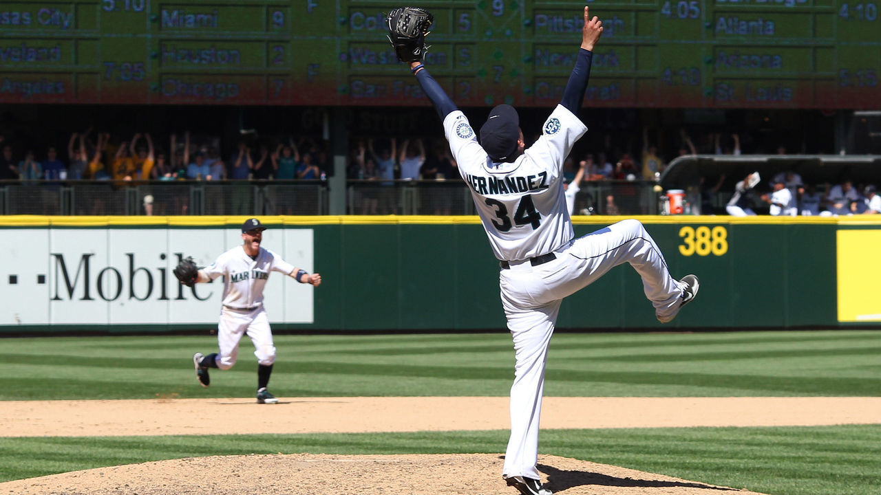 SEATTLE, WA - AUGUST 15: Starting pitcher Felix Hernandez #34 of the Seattle Mariners celebrates after throwing a perfect game against the Tampa Bay Rays at Safeco Field on August 15, 2012 in Seattle, Washington.