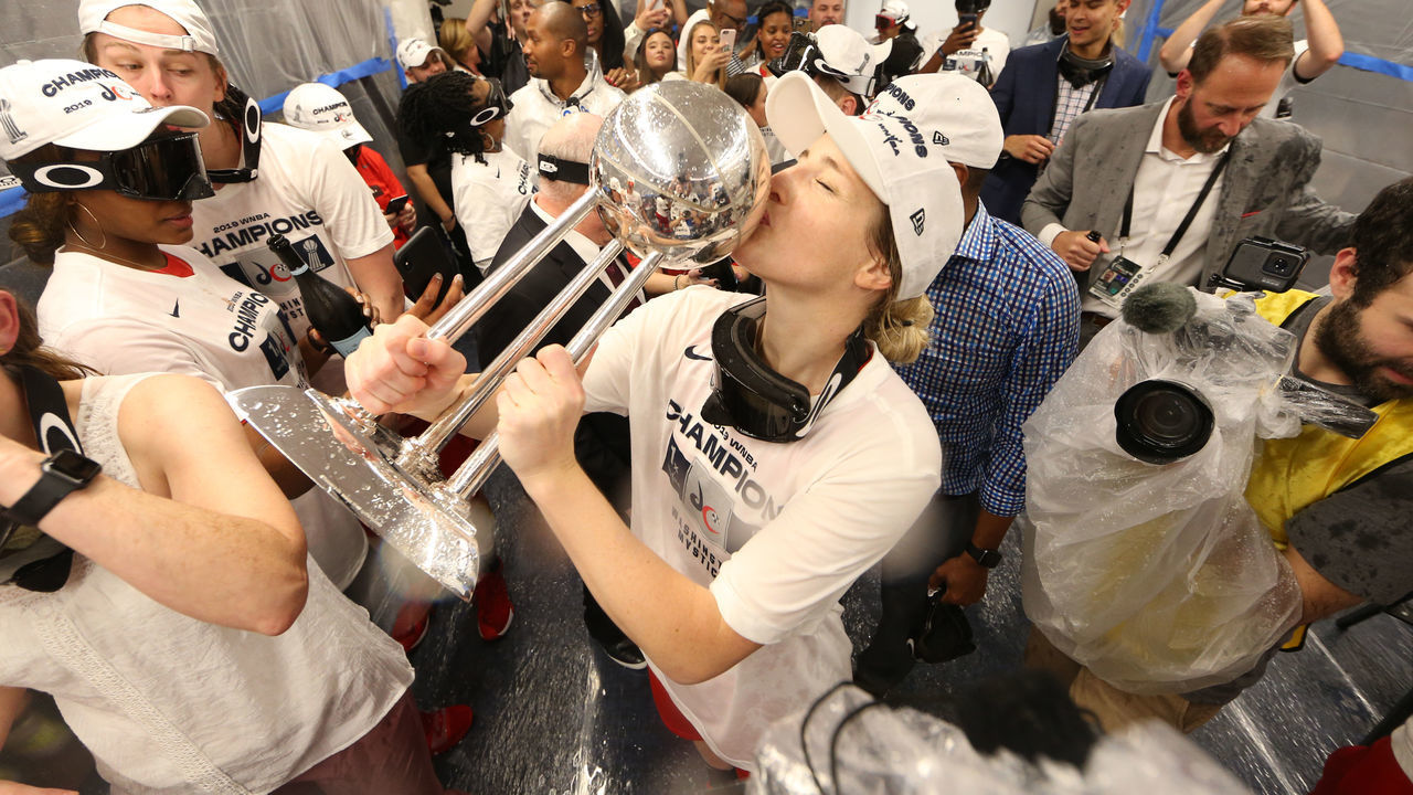 WASHINGTON, DC - OCTOBER 10: Kim Mestdagh #6 of the Washington Mystics smiles with the WNBA Championship Trophy after Game Five of the 2019 WNBA Finals on October 10, 2019 at St Elizabeths East Entertainment & Sports Arena in Washington, DC. Mandatory Copyright Notice: Copyright 2019 NBAE
