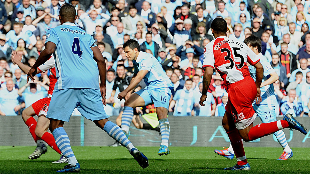 Manchester City's Argentinian striker Sergio Aguero (3rd R) scores their late winning goal during the English Premier League football match between Manchester City and Queens Park Rangers at The Etihad stadium in Manchester, north-west England on May 13, 2012. Manchester City won the game 3-2 to secure their first title since 1968. This is the first time that the Premier league title has been decided on goal-difference, Manchester City and Manchester United both finishing on 89 points. AFP PHOTO/PAUL ELLIS AFP PHOTO/PAUL ELLIS RESTRICTED TO EDITORIAL USE. No use with unauthorized audio, video, data, fixture lists, club/league logos or 'live' services. Online in-match use limited to 45 images, no video emulation. No use in betting, games or single club/league/player publications.