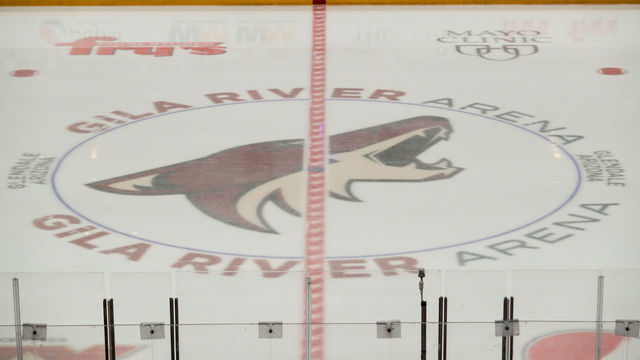 GLENDALE, AZ - MARCH 26: The Coyotes logo on the ice during the NHL hockey game between the Chicago Blackhawks and the Arizona Coyotes on March 26, 2019 at Gila River Arena in Glendale, Arizona.