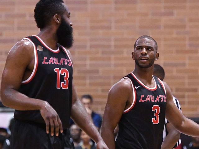 LOS ANGELES, CA - JULY 30: Houston Rockets guards Chris Paul (3) talks with James Harden (13) during a Drew League game at King Drew Magnet High School on July 30th, 2017.