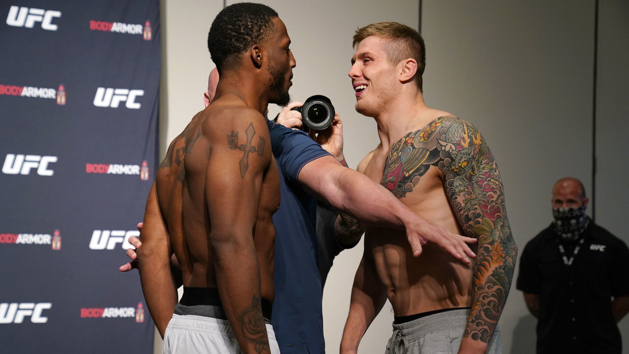 JACKSONVILLE, FLORIDA - MAY 12: (L-R) Opponents Karl Roberson and Marvin Vettori of Italy face off during the official UFC Fight Night weigh-in on May 12, 2020 in Jacksonville, Florida.