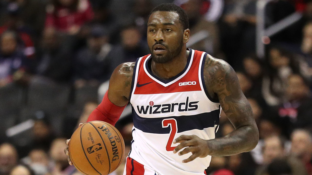 WASHINGTON, DC - NOVEMBER 12: John Wall #2 of the Washington Wizards dribbles against the Orlando Magic during the second half at Capital One Arena on November 12, 2018 in Washington, DC.