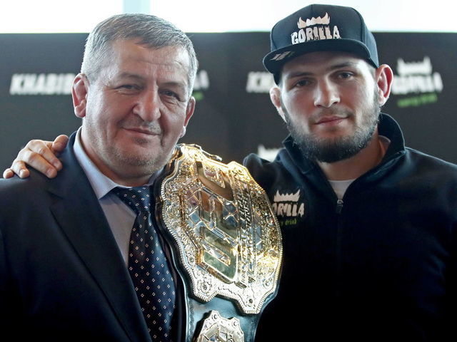 MOSCOW, RUSSIA NOVEMBER 26, 2018: Russian mixed martial artist and UFC lightweight champion Khabib Nurmagomedov (L) with his father and coach Abdulmanap Nurmagomedov at a news conference. Valery Sharifulin/TASS