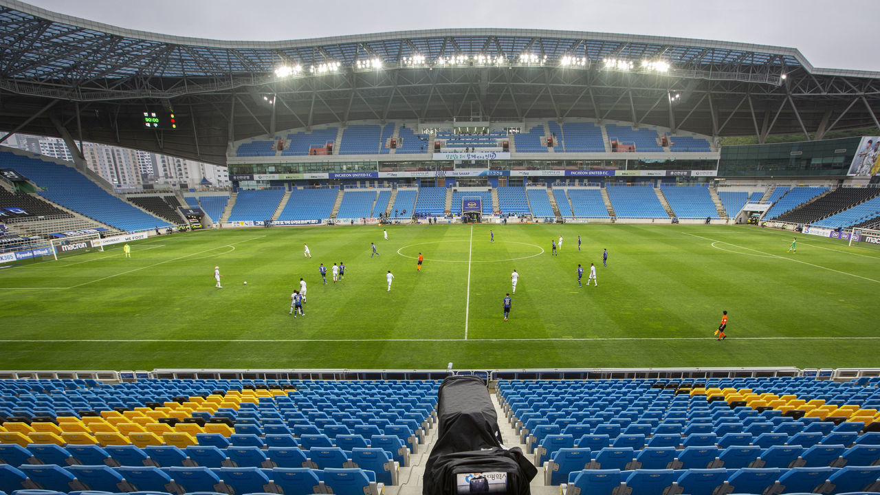 INCHEON, SOUTH KOREA - MAY 9: A soccer game (Incheon United FC vs Deagu FC) is taking place at Incheon Football Stadium in Korea, without spectators due to Covid-19 on May 9, 2020 in Incheon, South Korea.