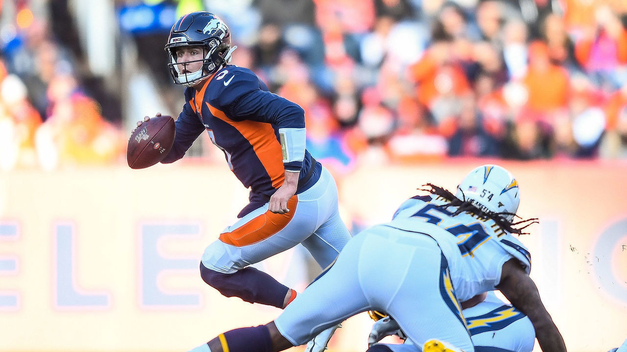 DENVER, CO - DECEMBER 1: Drew Lock #3 of the Denver Broncos rolls out of the pocket before passing against the Los Angeles Chargers in the first quarter of a game at Empower Field at Mile High on December 1, 2019 in Denver, Colorado.
