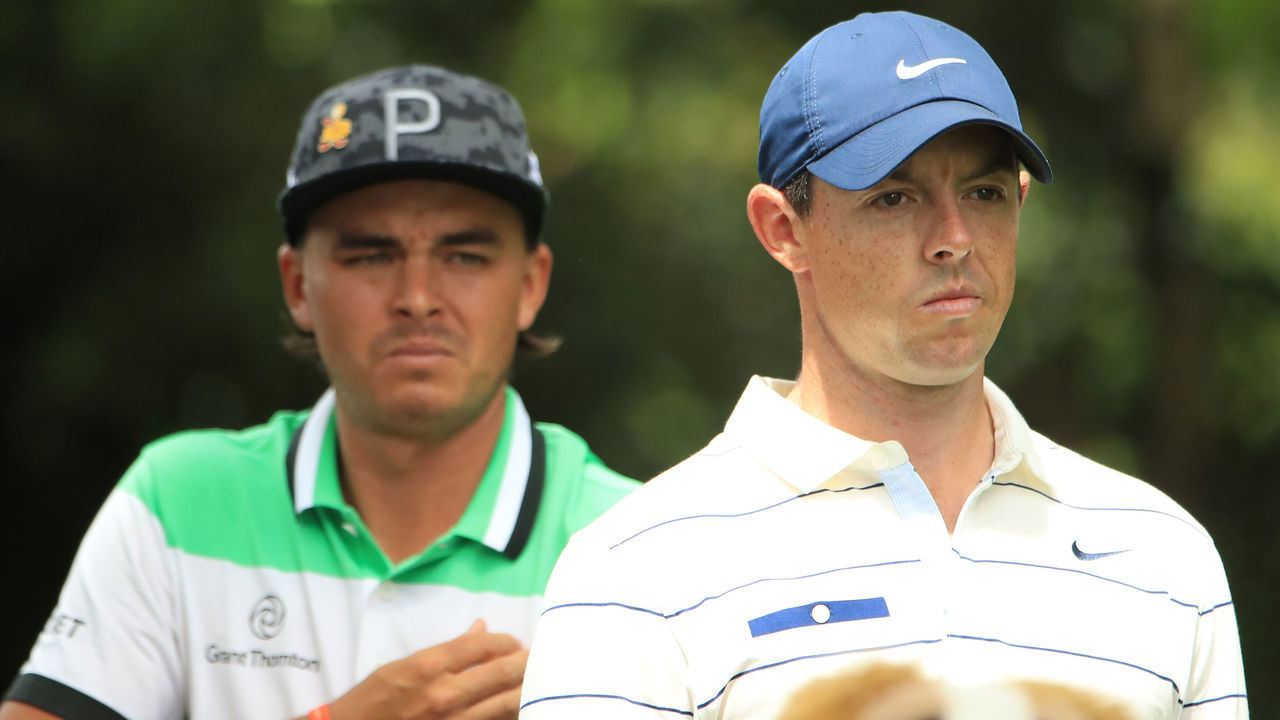 AUGUSTA, GEORGIA - APRIL 12: Rickie Fowler of the United States and Rory McIlroy of Northern Ireland stand on the second tee during the second round of the Masters at Augusta National Golf Club on April 12, 2019 in Augusta, Georgia.