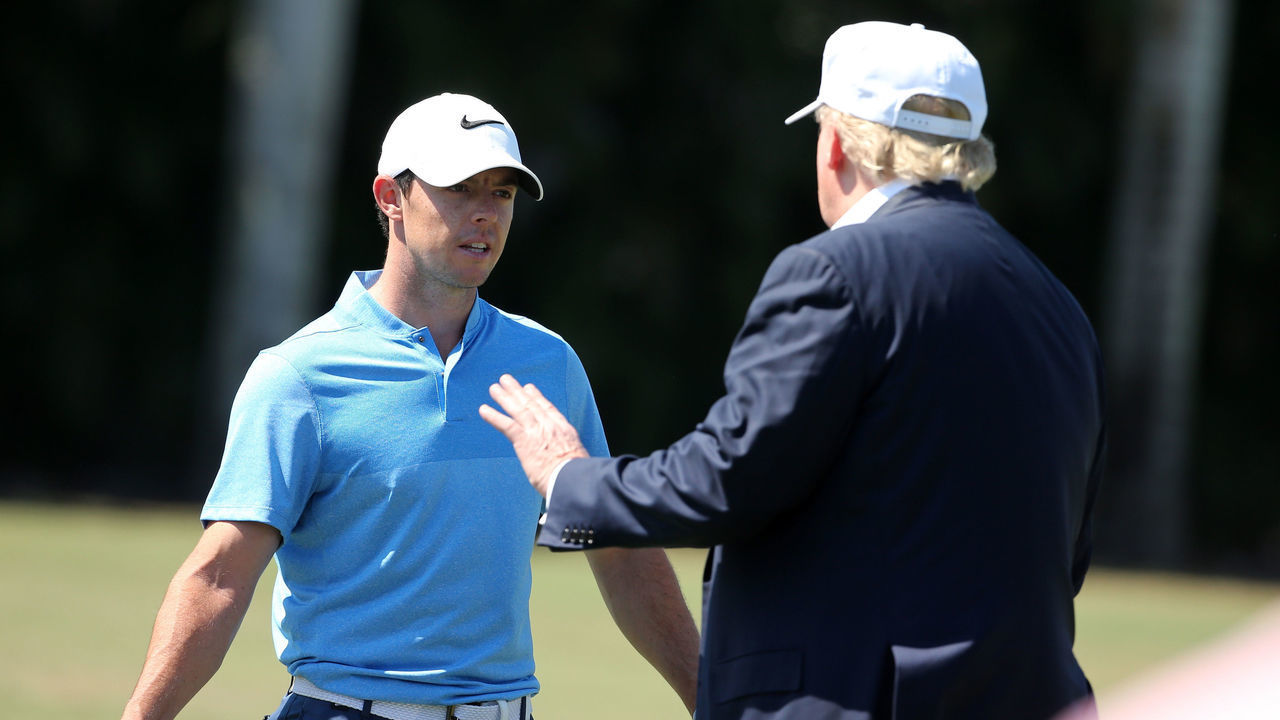 DORAL, FL - MARCH 06: Republican presidential candidate Donald Trump makes an appearance prior to the start of play and speaks with golfer Rory McIlroy of Northern Ireland during the final round of the World Golf Championships-Cadillac Championship at Trump National Doral Blue Monster Course on March 6, 2016 in Doral, Florida.