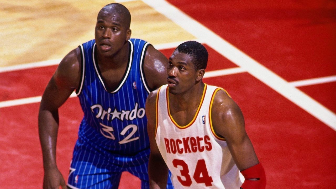 HOUSTON - JUNE 11: Hakeem Olajuwon #34 of the Houston Rockets posts up against Shaquille O'Neal #2 of the Orlando Magic during Game Three of the 1995 NBA Finals played June 11, 1995 at the Summitt in Houston, Texas. The Rockets won 106-103. NOTE TO USER: User expressly acknowledges that, by downloading and or using this photograph, User is consenting to the terms and conditions of the Getty Images License agreement. Mandatory Copyright Notice: Copyright 1995 NBAE