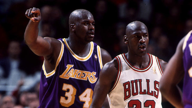 1998: Michael Jordan of the Chicago Bulls and Shaquille O'Neal of the Lakers during the Bulls' game versus the Los Angeles Lakers at the United Center in Chicago, IL.