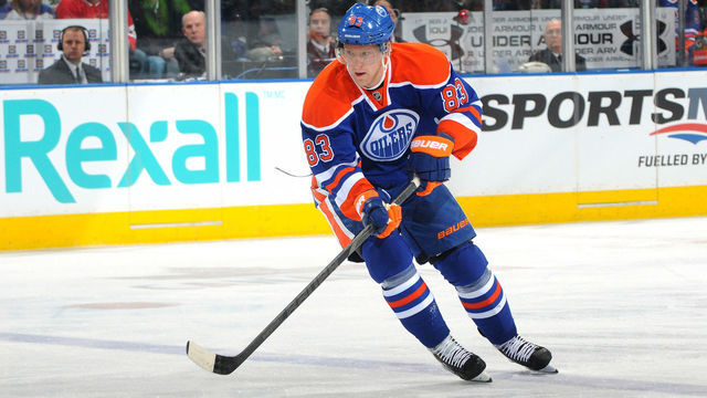 EDMONTON, CANADA - FEBRUARY 06 : Ales Hemsky #83 of the Edmonton Oilers skates with the puck in a game against the Dallas Stars on February 6, 2013 at Rexall Place in Edmonton, Alberta, Canada.