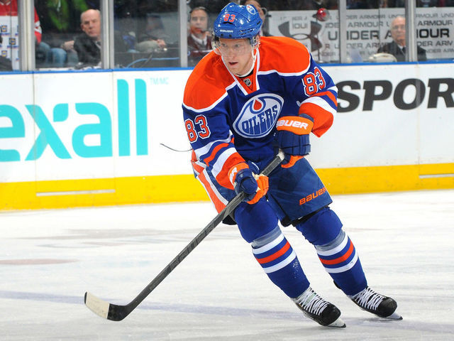 EDMONTON, CANADA - FEBRUARY 06 : Ales Hemsky #83 of the Edmonton Oilers skates with the puck in a game against the Dallas Stars on February 6, 2013 at Rexall Place in Edmonton, Alberta, Canada.