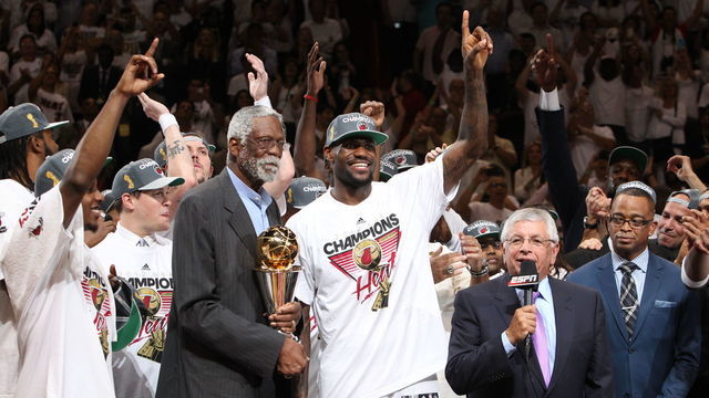 MIAMI, FL - JUNE 21: LeBron James #6 of the Miami Heat accepts the NBA Championship MVP Trophy from NBA Legend Bill Russell after the Miami Heat win the 2012 NBA Finals against the Oklahoma City Thunder in Game Five at American Airlines Arena on June 21, 2012 in Miami, Florida. Mandatory Copyright Notice: Copyright 2012 NBAE