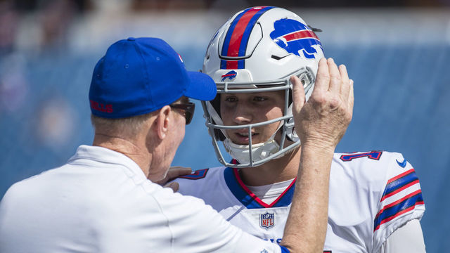 ORCHARD PARK, NY - SEPTEMBER 16: Hall of Famer Jim Kelly speaks with Josh Allen #17 of the Buffalo Bills before the game against the Los Angeles Chargers at New Era Field on September 16, 2018 in Orchard Park, New York.