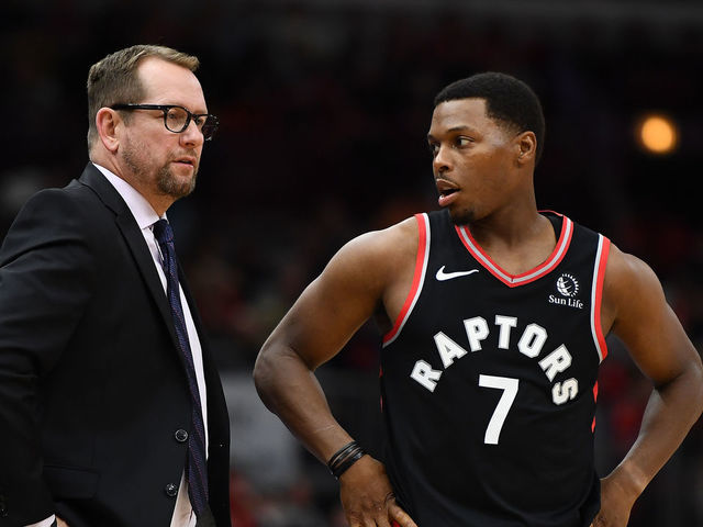 CHICAGO, ILLINOIS - OCTOBER 26: Head coach Nick Nurse of the Toronto Raptors speaks with Kyle Lowry #7 during the second half of a game against the Chicago Bulls at United Center on October 26, 2019 in Chicago, Illinois.
