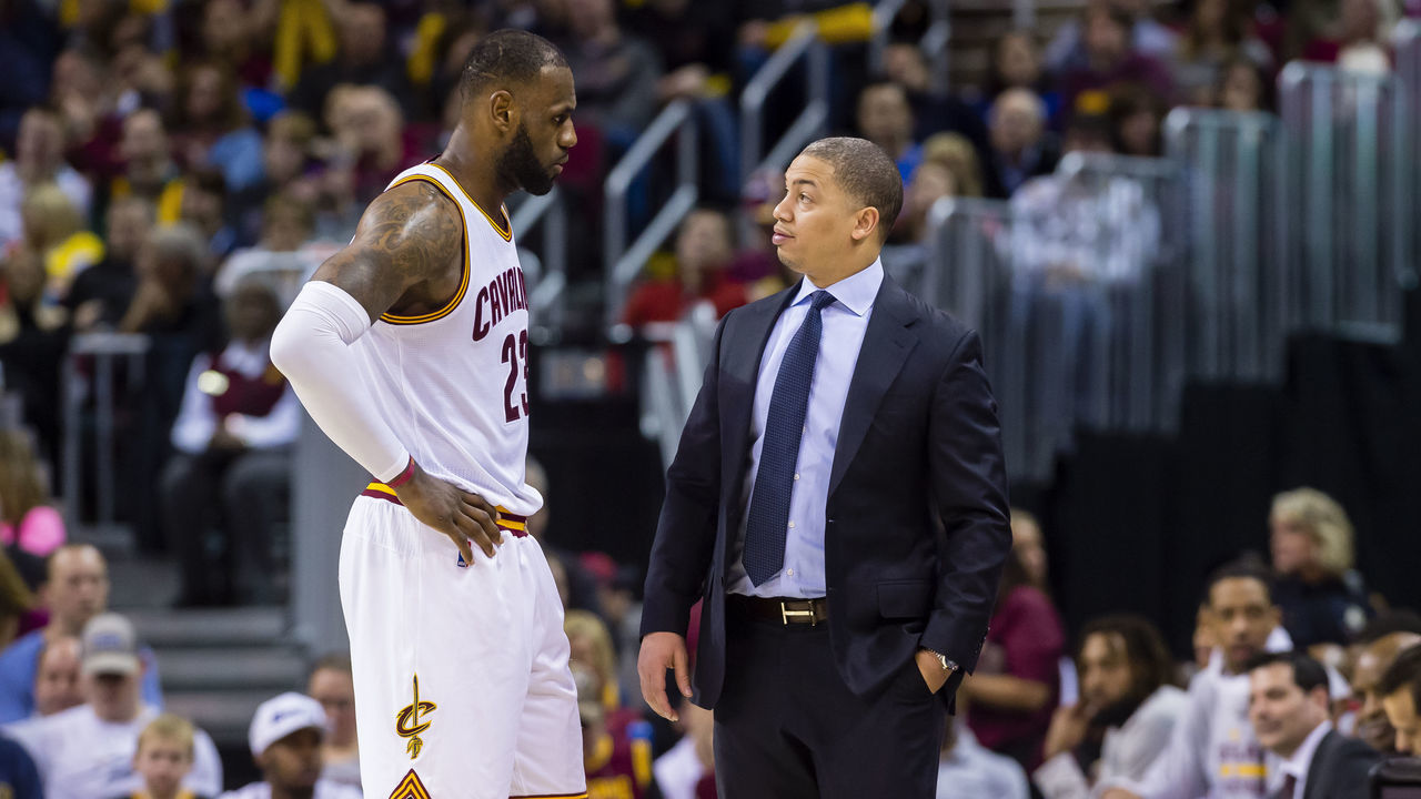 CLEVELAND, OH - FEBRUARY 11: LeBron James #23 talks with head coach Tyronn Lue of the Cleveland Cavaliers during the second half against the Denver Nuggets at Quicken Loans Arena on February 11, 2017 in Cleveland, Ohio. The Cavaliers defeated the Nuggets 125-109. NOTE TO USER: User expressly acknowledges and agrees that, by downloading and/or using this photograph, user is consenting to the terms and conditions of the Getty Images License Agreement. Mandatory copyright notice.