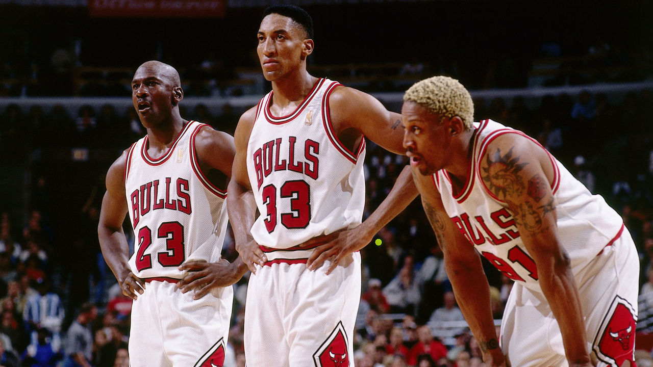 CHICAGO - MAY 20: (L to R) Michael Jordan #23, Scottie Pippen #33 and Dennis Rodman #91of the Chicago Bulls look on during a break in game action during the NBA Eastern Conference Finals against the Miami Heat at the United Center on May 20, 1997 in Chicago, Illinois. The Bulls won 84-77. NOTE TO USER: User expressly acknowledges and agrees that, by downloading and or using this photograph, User is consenting to the terms and conditions of the Getty Images License Agreement.