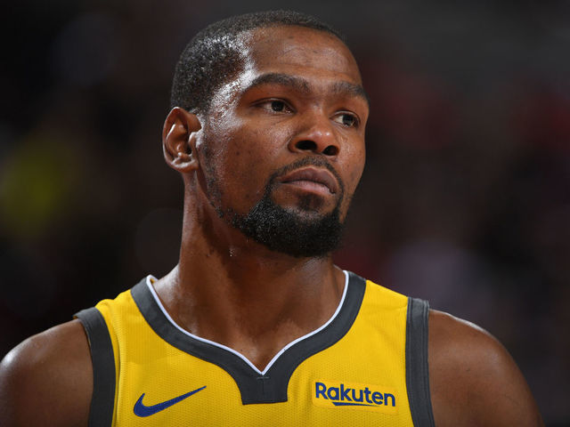 PORTLAND, OR - DECEMBER 29: Kevin Durant #35 of the Golden State Warriors looks on during the game against the Portland Trail Blazers on December 29, 2018 at the Moda Center Arena in Portland, Oregon. Mandatory Copyright Notice: Copyright 2018 NBAE
