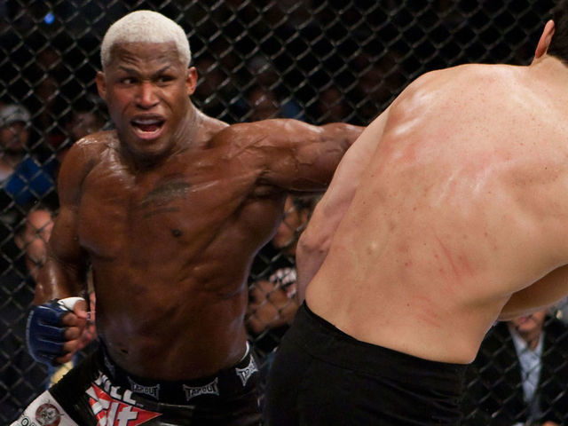 ST. LOUIS - MAY 15: (L-R) Kevin Randleman punches Roger Gracie during their bout at the Strikeforce: Heavy Artillery event at the Scottrade Center on May 15, 2010 in St. Louis, Missouri.