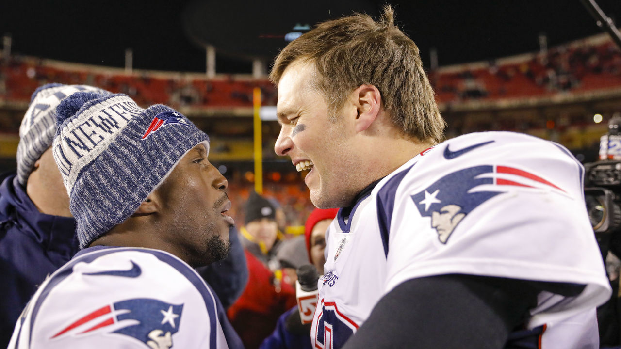 KANSAS CITY, MO - JANUARY 20: Quarterback Tom Brady #12 of the New England Patriots celebrates with teammate free safety Devin McCourty #32 of the New England Patriots following the Patriots' 37-31 overtime win in the AFC Championship Game against the Kansas City Chiefs at Arrowhead Stadium on January 20, 2019 in Kansas City, Missouri.