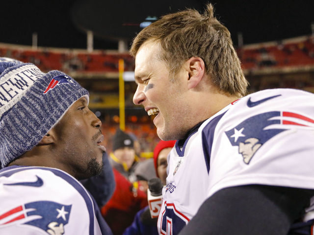 KANSAS CITY, MO - JANUARY 20: Quarterback Tom Brady #12 of the New England Patriots celebrates with teammate free safety Devin McCourty #32 of the New England Patriots following the Patriots' 37-31 overtime win in the AFC Championship Game against the Kansas City Chiefs at Arrowhead Stadium on January 20, 2019 in Kansas City, Missouri.
