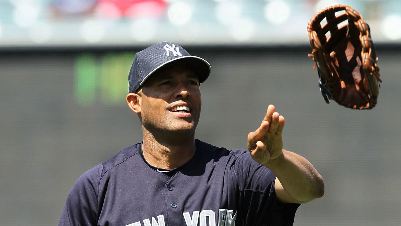 ANAHEIM, CA - JUNE 15: Pitcher Mariano Rivera #42 of the New York Yankees tosses his glove to a trainer prior to the MLB game against the Los Angeles Angels of Anaheim at Angel Stadium of Anaheim on June 15, 2013 in Anaheim, California. The Angels defeated the Yankees 6-2.