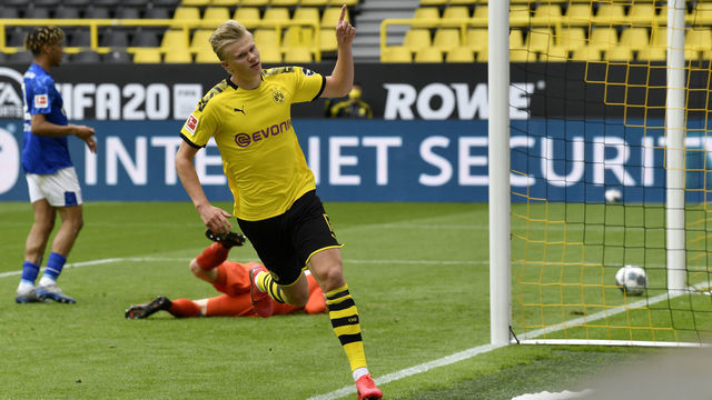 Dortmund's Norwegian forward Erling Braut Haaland celebrates after scoring the opening goal during the German first division Bundesliga football match BVB Borussia Dortmund v Schalke 04 on May 16, 2020 in Dortmund, western Germany as the season resumed following a two-month absence due to the novel coronavirus COVID-19 pandemic.