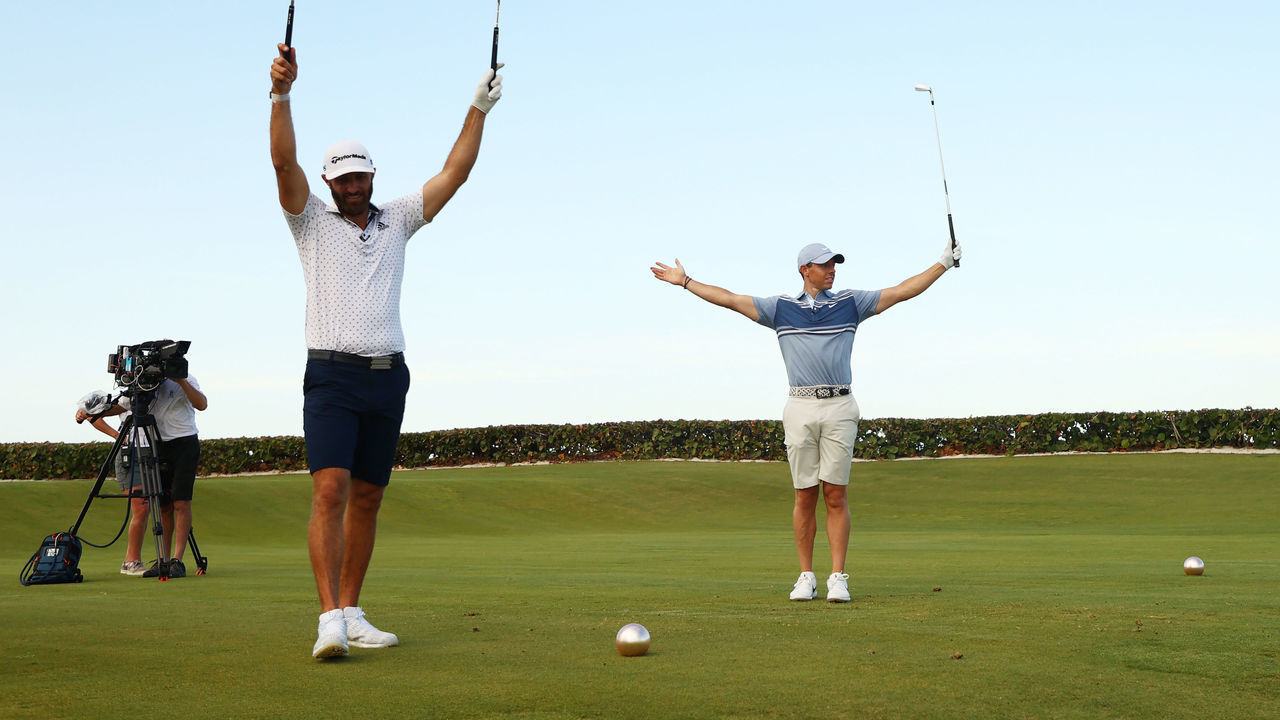 JUNO BEACH, FLORIDA - MAY 17: Rory McIlroy of the American Nurses Foundation team and Dustin Johnson of the American Nurses Foundation team react on the 17th tee after winning the closest to the pin playoff against Rickie Fowler of the CDC Foundation team and Matthew Wolff of the CDC Foundation team during the TaylorMade Driving Relieve Supported By UnitedHealth Group on May 17, 2020 at Seminole Golf Club in Juno Beach, Florida.