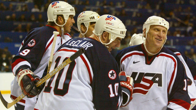 The United States Mens Hockey team defeated Germany in a quarterfinal match, 50, at the 2002 Winter Olympics E Center in Salt Lake City. The USA's Brett Hull is congratulated by teammates after scoring the USA's fifth goal in the 2nd period of play on 2/20/01.