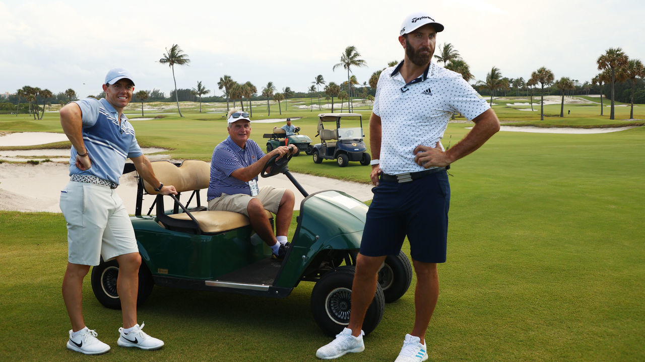 JUNO BEACH, FLORIDA - MAY 17: Rory McIlroy of the American Nurses Foundation team and Dustin Johnson of the American Nurses Foundation team speak to President of Seminole Golf Club Jimmy Dunne after winning the closest to the pin playoff against Rickie Fowler of the CDC Foundation team and Matthew Wolff of the CDC Foundation team during the TaylorMade Driving Relieve Supported By UnitedHealth Group on May 17, 2020 at Seminole Golf Club in Juno Beach, Florida.