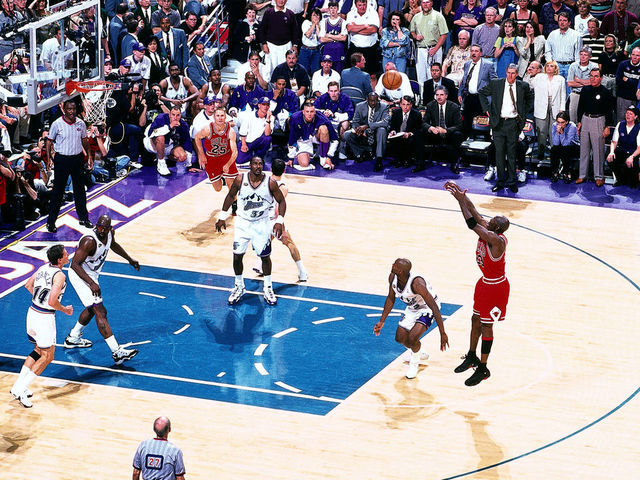 SAL LAKE CITY - JUNE 14: Michael Jordan #23 of the Chicago Bulls shoots the game winner against the Utah Jazz in the 1998 NBA FINALS of Game 6. The shot gave the Bulls their sixth NBA title, 87-86 at the Delta Center, Salt Lake City, Utah. NOTE TO USER: User expressly acknowledges and agrees that, by downloading and or using this photograph, User is consenting to the terms and conditions of the Getty Images License Agreement. Mandatory copyright notice: Copyright NBAE 2002