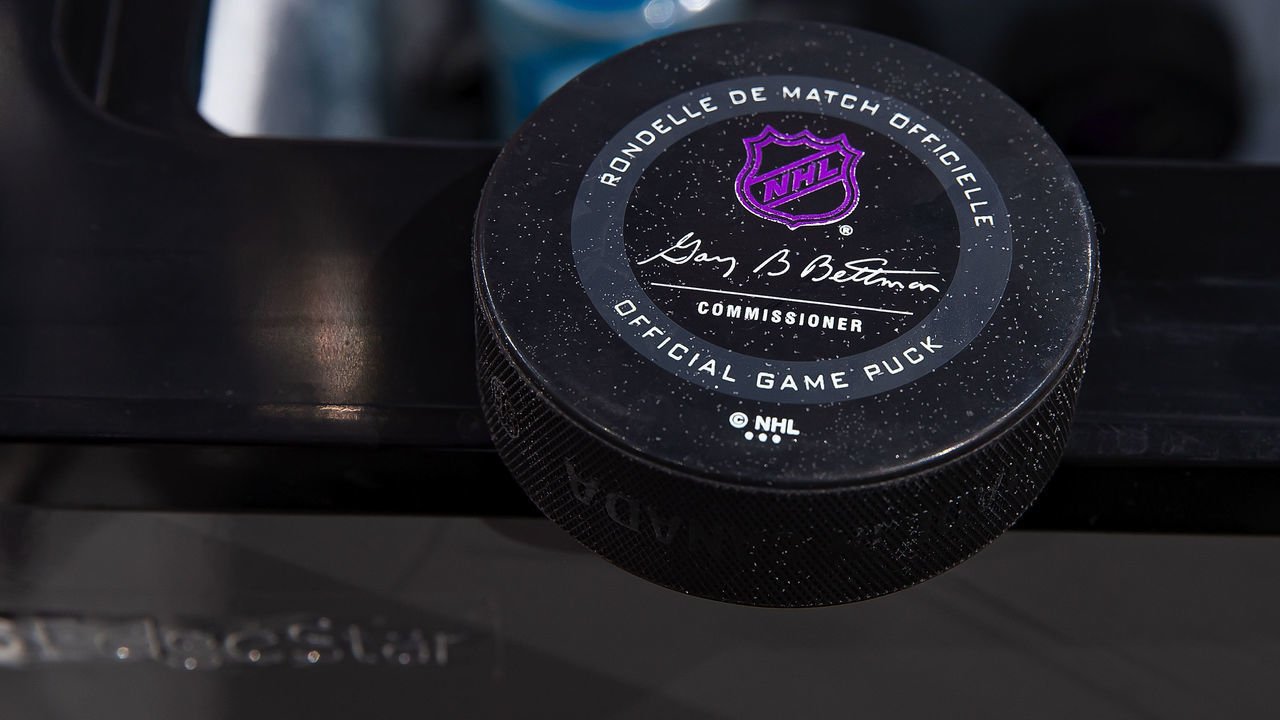 DETROIT, MI - NOVEMBER 08: A picture in the penalty box of this years official game pucks NHL logo turns purple once frozen before the start of an NHL game between the Detroit Red Wings and the Boston Bruins at Little Caesars Arena on November 8, 2019 in Detroit, Michigan. Detroit defeated Boston 4-2.