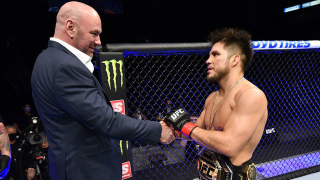 JACKSONVILLE, FLORIDA - MAY 09: Henry Cejudo talks with UFC president Dana White after announcing his retirement in the Octagon after his UFC bantamweight championship fight during the UFC 249 event at VyStar Veterans Memorial Arena on May 09, 2020 in Jacksonville, Florida.