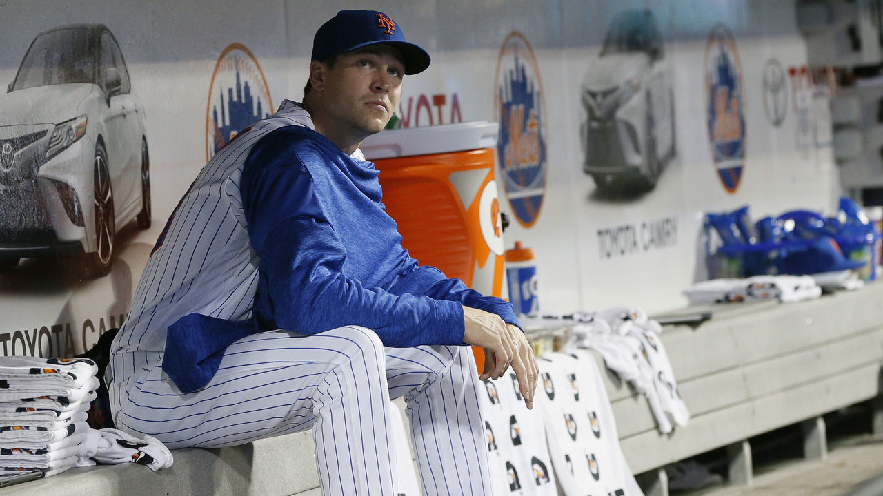 NEW YORK, NY - JULY 23: Pitcher Jacob deGrom #48 of the New York Mets reacts in the dugout during an MLB baseball game against the San Diego Padres on July 23, 2018 at Citi Field in the Queens borough of New York City. Padres won 3-2.