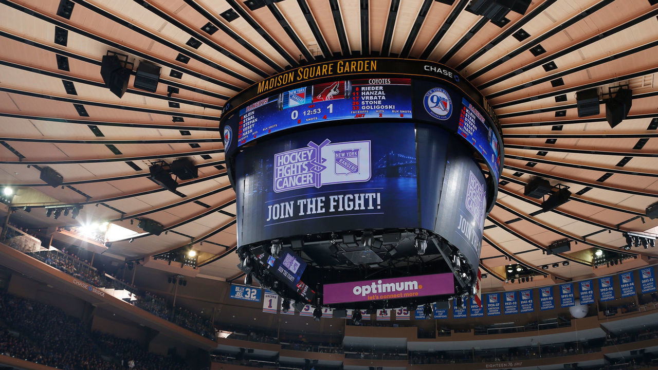 NEW YORK, NY - OCTOBER 23: Hockey Fights Cancer signage is displayed on Gardenvision during Hockey Fights Cancer Awareness Night on October 23, 2016 against the Arizona Coyotes at Madison Square Garden in New York City. The New York Rangers won 3-2. *** Local Caption ***