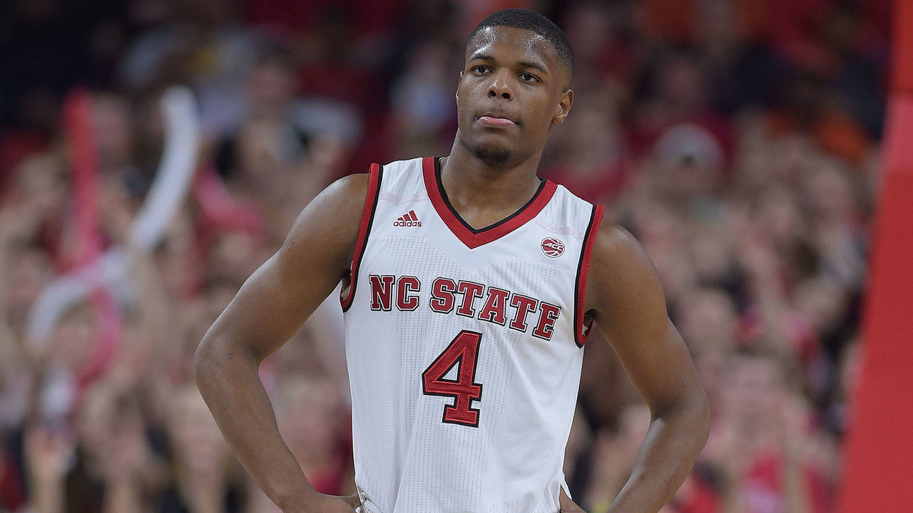 RALEIGH, NC - FEBRUARY 01: Dennis Smith Jr. #4 of the North Carolina State Wolfpack looks on against the Syracuse Orange at PNC Arena on February 1, 2017 in Raleigh, North Carolina.
