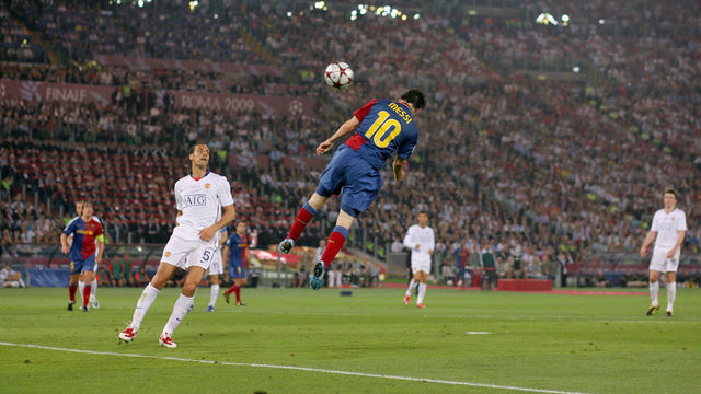27 May 2009 Rome UEFA Champions League Final - FC Barcelona v Manchester United - Rio Ferdinand of United can only watch as Lionel Messi of Barcelona heads the second goal
