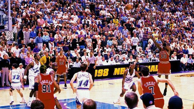 SALT LAKE CITY, UT - JUNE 14: Michael Jordan #23 of the Chicago Bulls hits the game winning shot against the Utah Jazz during Game Six of the 1998 NBA Finals played June 14, 1998 at the Delta Center in Salt Lake City, Utah. The Chicago Bulls defeated the Utah Jazz 4-2 to win the NBA Championship. NOTE TO USER: User expressly acknowledges that, by downloading and or using this photograph, User is consenting to the terms and conditions of the Getty Images License agreement. Mandatory Copyright Notice: Copyright 1998 NBAE