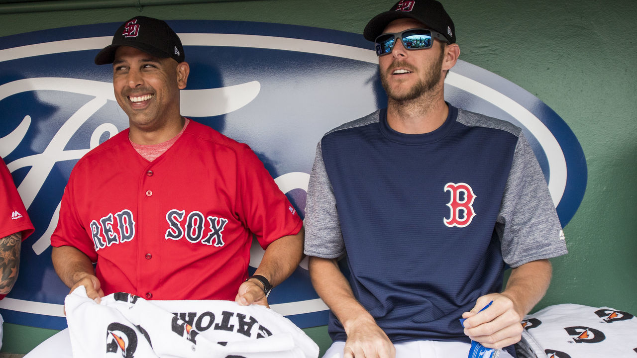 FORT MYERS, FL - FEBRUARY 23: Manager Alex Cora and Chris Sale #41 of the Boston Red Sox react during a game against the Minnesota Twins at JetBlue Park at Fenway South on February 23, 2018 in Fort Myers, Florida.