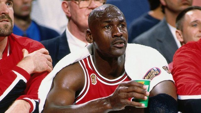 SALT LAKE CITY, UT - JUNE 11: Michael Jordan #23 of the Chicago Bulls sits on the bench wrapped in towels during Game Five of the 1997 NBA Finals played against the Utah Jazz on June 11, 1997 at the Delta Center in Salt Lake City, Utah. The Chicago Bulls defeated the Utah Jazz 90-88. Mandatory Copyright Notice: Copyright 1997 NBAE