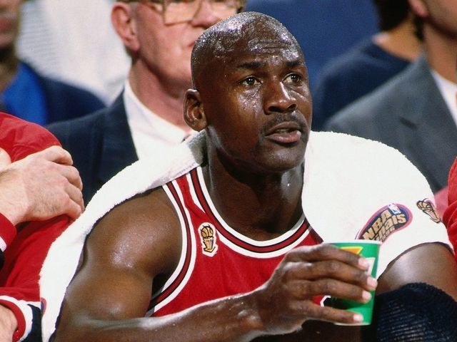 SALT LAKE CITY, UT - JUNE 11: Michael Jordan #23 of the Chicago Bulls sits on the bench wrapped in towels during Game Five of the 1997 NBA Finals played against the Utah Jazz on June 11, 1997 at the Delta Center in Salt Lake City, Utah. The Chicago Bulls defeated the Utah Jazz 90-88. Mandatory Copyright Notice: Copyright 1997 NBAE