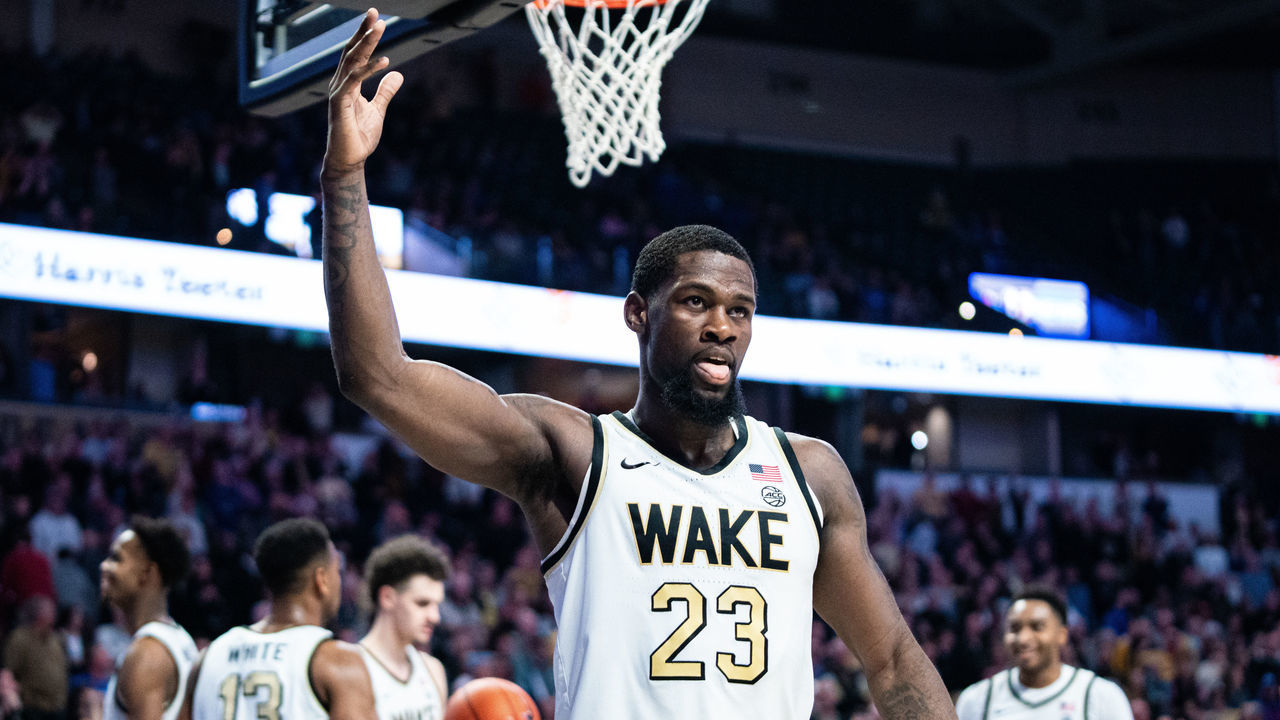 WINSTON-SALEM, NORTH CAROLINA - FEBRUARY 25: Chaundee Brown #23 of the Wake Forest Demon Deacons encourages the fans near the end of double overtime during their game against the Duke Blue Devils at LJVM Coliseum Complex on February 25, 2020 in Winston-Salem, North Carolina.