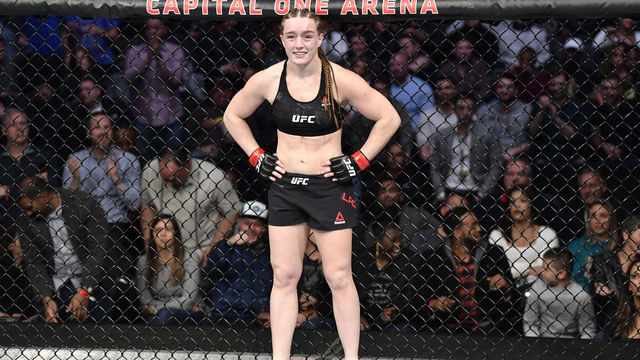WASHINGTON, DC - DECEMBER 07: Aspen Ladd celebrates her TKO victory over Yana Kunitskaya of Russia in their women's bantamweight bout during the UFC Fight Night event at Capital One Arena on December 07, 2019 in Washington, DC.