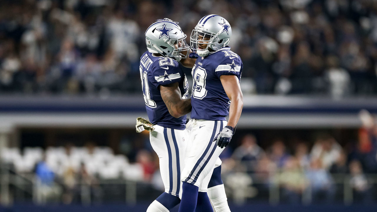 ARLINGTON, TX - NOVEMBER 05: Dallas Cowboys wide receiver Amari Cooper (19) celebrates his touchdown with running back Ezekiel Elliott (21) during the game between the Tennessee Titans and Dallas Cowboys on November 5, 2018 at AT&T Stadium in Arlington, TX.