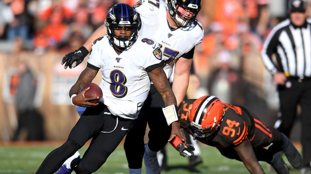 CLEVELAND, OH - DECEMBER 22, 2019: Quarterback Lamar Jackson #8 of the Baltimore Ravens carries the ball in the third quarter of a game against the Cleveland Browns on December 22, 2019 at FirstEnergy Stadium in Cleveland, Ohio. Baltimore won 31-15. (Photo by: 2019 Nick Cammett/Diamond Images via Getty Images)