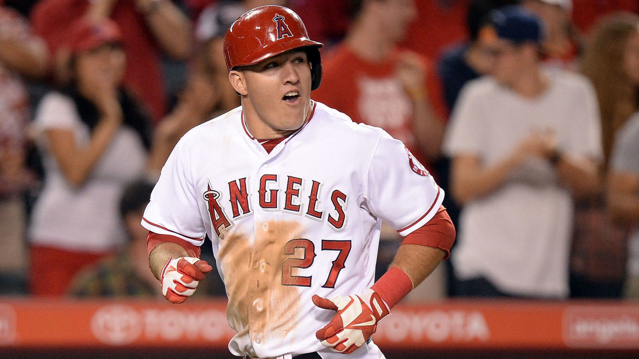 ANAHEIM, CA - MAY 21: Mike Trout #27 of the Los Angeles Angels reacts to his solo homerun for a 12-0 lead over the Seattle Mariners during the eighth inning at Angel Stadium of Anaheim on May 21, 2013 in Anaheim, California. The homerun gave Trout a single, double, triple and homerun, giving him the cycle for the game.